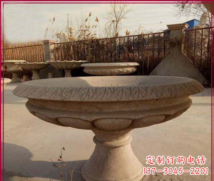 石家庄黄锈石花盆雕塑,让花园更加美丽