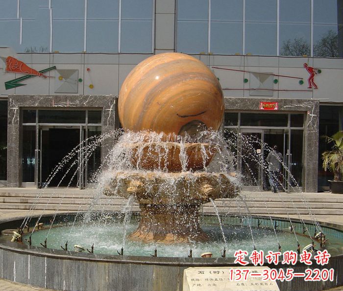 石家庄石来运转球晚霞红风水球石雕