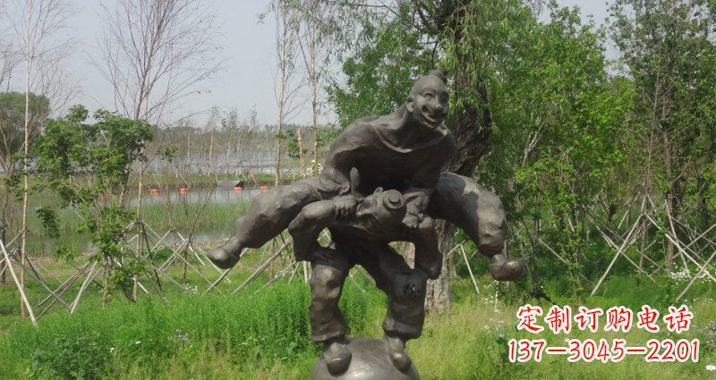 石家庄园林站在球上面跳山羊的人物景观铜雕